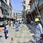 IESCO linemen install new cables at Pir Chowk to improve power supply and stabilize voltage in twin cities