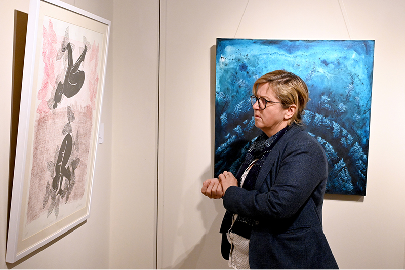 A visitor view the group painting exhibition of 40 artists with "THRESHOLD" at Arfiras Art Gallery