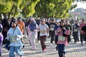 Women participate in the Rakhshanda Memorial Club Women Run 2026 at Fatima Jinnah Park (F-9 Park)
