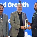 Federal Minister for Poverty Alleviation and Social Safety, Syed Imran Ahmed Shah presenting gift to Federal Minister for Information and Broadcasting, Attaullah Tarar during the International Conference on "Inclusive and Resilient Economic Empowerment and Growth" organized by Pakistan Poverty Alleviation Fund (PPAF) at local hotel