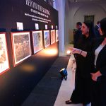 Visitors view Picture exhibition The Mountains We "SHARE" People, Snow Leopards and Stories of Coexistence, organized by WWF-Pakistan at local hotel