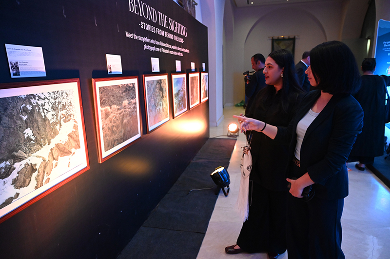 Visitors view Picture exhibition The Mountains We "SHARE" People, Snow Leopards and Stories of Coexistence, organized by WWF-Pakistan at local hotel