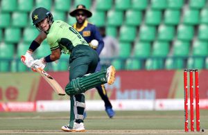 Pakistani batsman Maaz Sadaqat batter plays a shot during the ODI tri-series cricket match against Sri Lanka at Gaddafi Stadium.