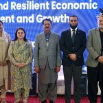 Federal Minister for Information and Broadcasting, Attaullah Tarar in a group photograph during the International Conference on "Inclusive and Resilient Economic Empowerment and Growth" organized by Pakistan Poverty Alleviation Fund (PPAF) at local hotel