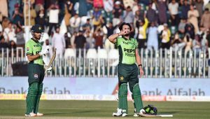 Pakistani batter Salman Ali Agha celebrates after scoring a century during the ODI Tri-Nation Series match between Pakistan and Sri Lanka at Rawalpindi Cricket Stadium