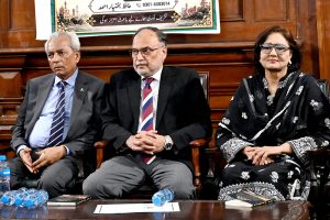 Federal Minister for Planning and Development Ahsan Iqbal addresses a book launch ceremony at the Quaid-e-Azam Library.
