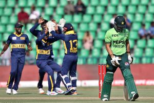 Pakistani batsman Maaz Sadaqat batter plays a shot during the ODI tri-series cricket match against Sri Lanka at Gaddafi Stadium.