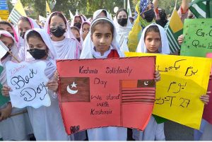 Governor of Khyber Pakhtunkhwa Faisal Karim Kundi addresses participants during a protest marking Kashmir Black Day outside the Governor House.