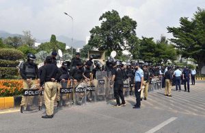 Security officials place containers in Islamabad’s Red Zone, which houses most embassies and government offices, following the imposition of an emergency and governor’s rule in Khyber Pakhtunkhwa, approved by President Asif Ali Zardari, amid heightened tensions between the federal government and the PTI-led provincial administration during the party’s ongoing protest campaign