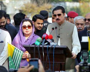 Governor of Khyber Pakhtunkhwa Faisal Karim Kundi addresses participants during a protest marking Kashmir Black Day outside the Governor House.