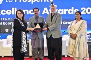Federal Minister for Poverty Alleviation and Social Safety, Syed Imran Ahmed Shah presenting media excellence award to participant during International Conference on "Inclusive and Resilient Economic Empowerment and Growth" organized by Pakistan Poverty Alleviation Fund (PPAF) at local hotel