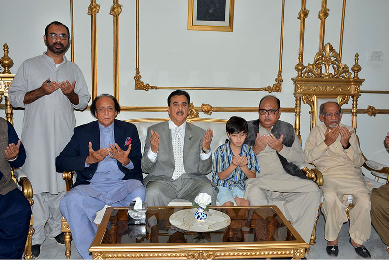 Chairman Senate Syed Yousaf Raza Gilani offers Fateha for the departed soul of late former minister Malik Mukhtar Ahmad Awan at his residence
