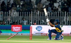 Sri Lankan batter Dunith Wellalage is bowled out during the T20 cricket match between Pakistan and Sri Lanka at Rawalpindi Cricket Stadium.