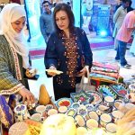 Visitors explore stalls during International Conference on "Inclusive and Resilient Economic Empowerment and Growth" organized by Pakistan Poverty Alleviation Fund (PPAF) at local hotel