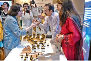 Visitors explore stalls during International Conference on "Inclusive and Resilient Economic Empowerment and Growth" organized by Pakistan Poverty Alleviation Fund (PPAF) at local hotel