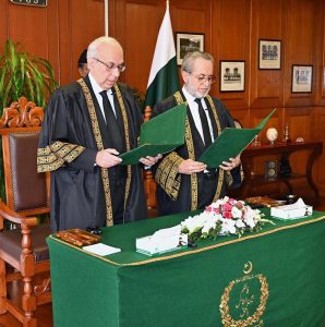 Mr. Justice Munib Akhtar, the Senior Puisne Judge of the Supreme Court of Pakistan, taking oath as Acting Chief Justice, Supreme Court of Pakistan at Supreme Court of Pakistan Islamabad.