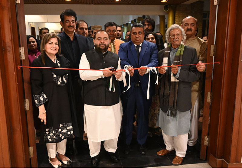 Federal Minister for National Heritage and Culture Aurangzeb Khan Khichi cuts a ribbon to inaugurate a painting exhibition by artists of the visiting Bangladeshi delegation, organized by the National Heritage and Culture Division at the Pakistan National Council of the Arts (PNCA)