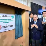 Prime Minister Muhammad Shehbaz Sharif unveils the plaque of the groundbreaking ceremony of Kashmir Chowk Underpass