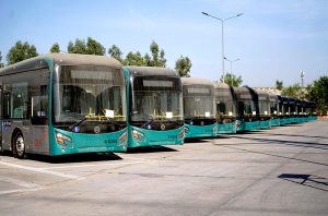 Newly acquired 25 BRT buses are transported by trucks from Karachi Port to the BRT headquarters.