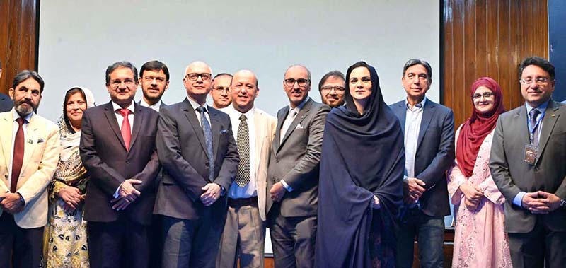 Medical experts, including Chairperson Prof. Dr. Ayesha Humayun and Dr. Tariq Ali Bangash, pose for a group photo during the inaugural ceremony of the 4th International Conference on Medical Education and Research (ICHPER) at Sheikh Zayed Hospital
