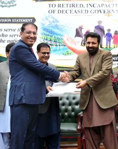Chief Minister Gilgit-Baltistan Amjad Hussain distributes Benevolent Fund and Group Insurance cheques among retired government employees.