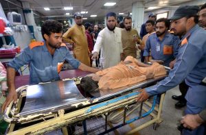 The bodies of children who lost their lives in the school building collapse are brought to Dir Colony for funeral prayers.