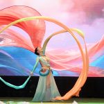 A Chinese artist performs a traditional dance with long flowing ribbons during the launch ceremony of the China-Pakistan Information Corridor (CPIC) at the Pakistan-China Friendship Centre