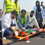Doctors and emergency medical responders provide critical care, oxygen support, and triage assistance to a simulated casualty during a Full-Scale Emergency Exercise at Multan International Airport. The drill was organized by the Pakistan Airports Authority (PAA) to test inter-agency medical coordination, rapid response times, and life-saving equipment functionality