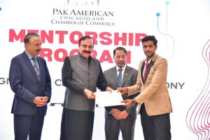 Federal Minister for Parliamentary Affairs Dr. Tariq Fazal Chaudhary distribute awards and certificates in an event organised by Pakistan American Chicagoland Chamber of Commerce.