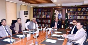 Federal Minister for Finance and Revenue, Senator Muhammad Aurangzeb, chairing a meeting at the Finance Division to review progress on the retailers' tax scheme at the Finance Division.