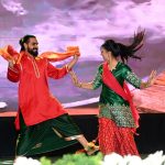 Artists perform a traditional dance during the launch ceremony of the China-Pakistan Information Corridor (CPIC) at the Pakistan-China Friendship Centre