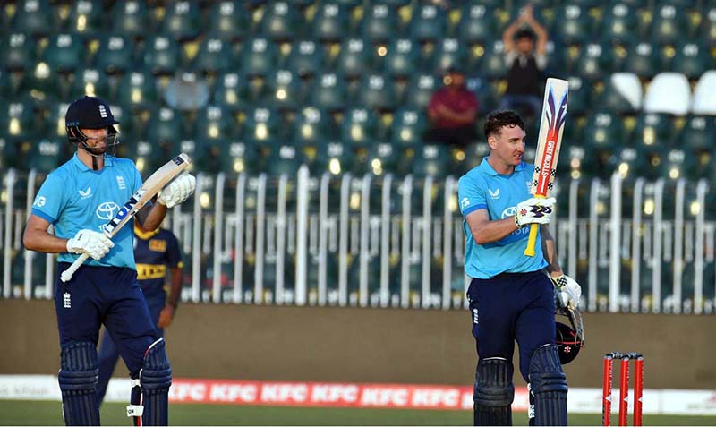 England's Harry Brook celebrates after scoring double century during the tri-nation series one-day international cricket match between Sri Lanka and England in Rawalpindi Cricket Stadium