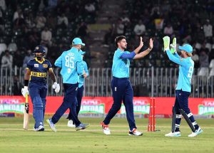 England's Harry Brook celebrates after scoring double century during the tri-nation series one-day international cricket match between Sri Lanka and England in Rawalpindi Cricket Stadium