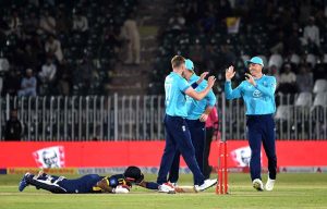 England's Harry Brook celebrates after scoring double century during the tri-nation series one-day international cricket match between Sri Lanka and England in Rawalpindi Cricket Stadium