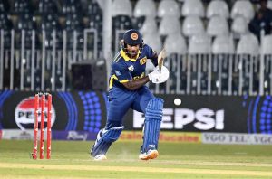 England's Harry Brook celebrates after scoring double century during the tri-nation series one-day international cricket match between Sri Lanka and England in Rawalpindi Cricket Stadium