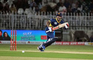 Pakistani players celebrate after taking a wicket Sri Lankan Kusal Mendis during the Tri-Nation Series cricket match between Pakistan and Sri Lanka at Rawalpindi Cricket Stadium