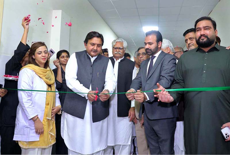 Speaker Punjab Assembly Malik Muhammad Ahmad Khan cutting ribbon to inaugurate a cancer ward at Madina Teaching Hospital during his visit to The University of Faisalabad (TUF)