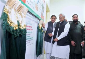 Speaker Punjab Assembly Malik Muhammad Ahmad Khan cutting ribbon to inaugurate a cancer ward at Madina Teaching Hospital during his visit to The University of Faisalabad (TUF)