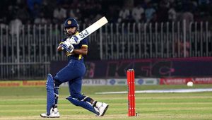 Sri Lankan batter Pavan Rathnayake plays a shot during the Tri-Nation Series cricket match between Pakistan and Sri Lanka at Rawalpindi Cricket Stadium