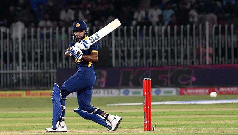Sri Lankan batter Pavan Rathnayake plays a shot during the Tri-Nation Series cricket match between Pakistan and Sri Lanka at Rawalpindi Cricket Stadium
