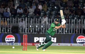 Pakistan’s batter Arafat Minhas plays a shot during the third T20 cricket match between Pakistan and Sri Lanka at Rawalpindi Cricket Stadium