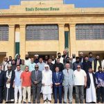 Sindh Governor Syed Muhammad Nihal Hashmi poses for a group photograph with chancellors, vice-chancellors, rectors and other international educationists representing universities from 34 Muslim countries at Governor House